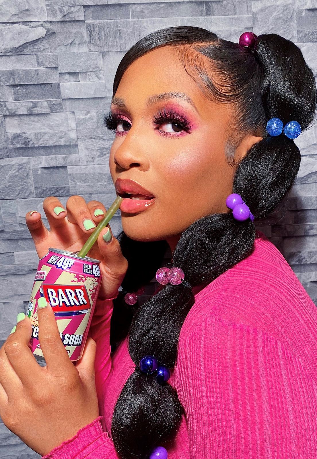 Bubble braid pigtails in a pink editorial shoot